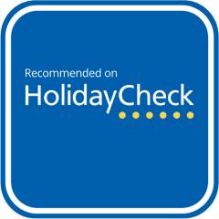 Recommended on HolidayCheck blue badge icon